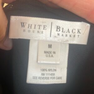 White House, black market size medium halter top